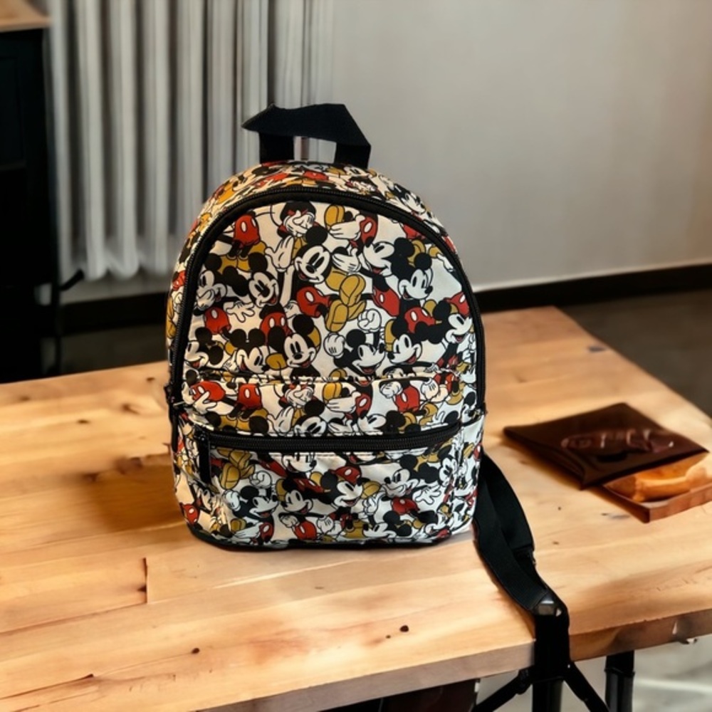 GENTLY USED DISNEY SMALL BACKPACK